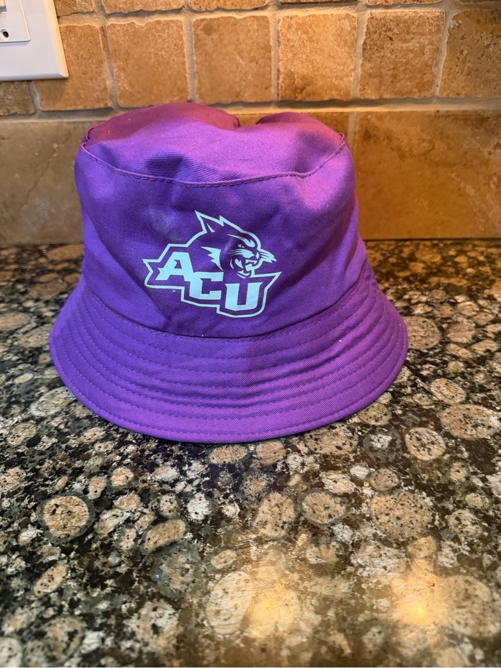 ACU reversible Purple Bucket Hat with Mascot Logo and patterned on other side